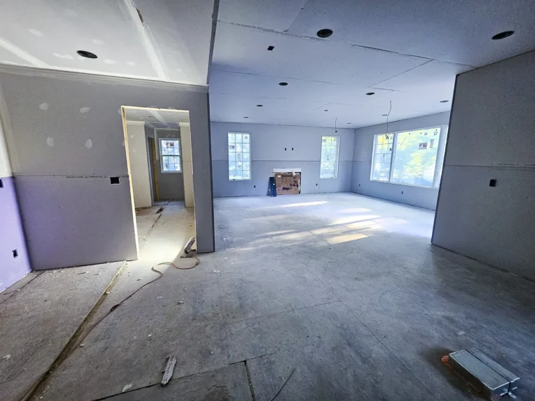 a room with a window and a wall