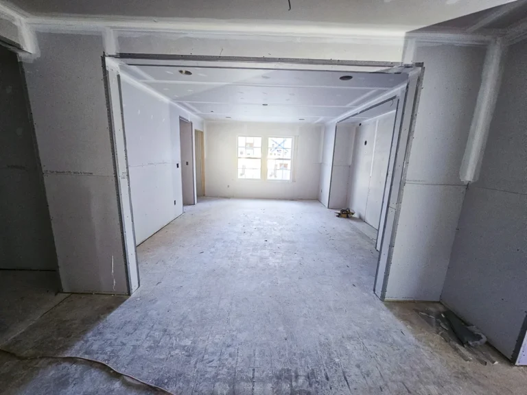 a room with a window and a wall